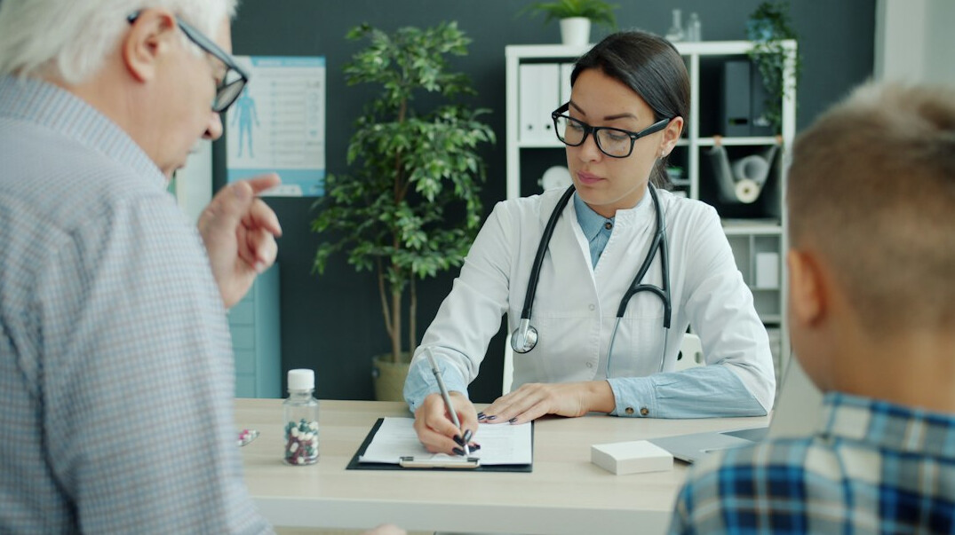 doctor advising patient on health plan