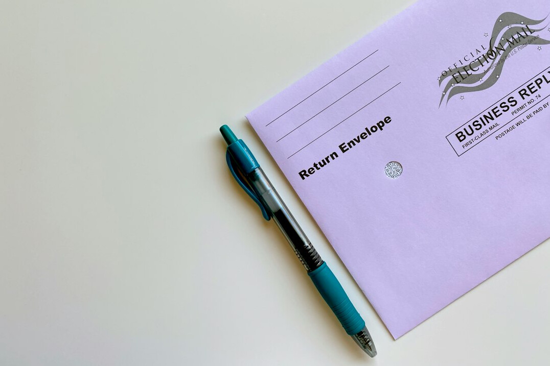 Medical folder with charts and a pen on a clinic desk